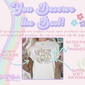May include: A white t-shirt with a pastel pink, blue, and yellow graphic that says "Caring for the Cutest Little Bunnies" with a bunny rabbit illustration and the words "Postpartum Nurse". The shirt is on a pink background with the text "You Deserve the Best!" in a pastel purple font. The text "Won't Crack or Peel!" is in a pink box with a white outline. The text "Rated for 50+ Washes" is in a pink box with a white outline. The text "Super Soft Material" is in a green box with a white outline.