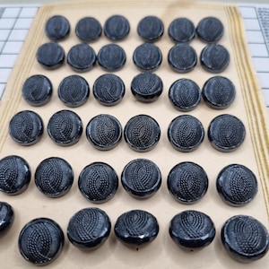 Art deco czechoslovakian all glass buttons  36 still on the board brand new old stock.