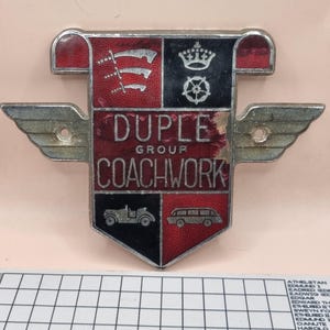 Vintage dubbelmärke från 1950-/60-talet