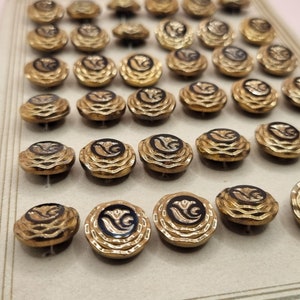 Art deco czechoslovakian all glass buttons still on the board brand new old stock.
