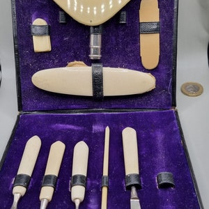 Set manicure Art Déco in osso/metallo