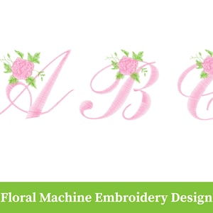 May include: Pink embroidered letters A, B, and C, each adorned with a pink rose and green leaves. The letters are in a cursive font. The image also includes the text "Floral Machine Embroidery Design" in a green banner.