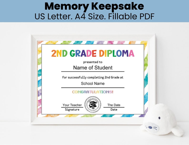 May include: A printable 2nd grade diploma certificate with a rainbow watercolor background. The text reads "2nd Grade Diploma" and includes spaces for the student's name, teacher's name, and the date.
