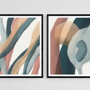 May include: Two abstract art prints with a modern minimalist style. The prints feature a combination of teal, blue, brown, and pink colors in a flowing, organic pattern.