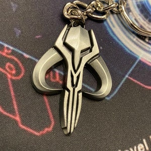 Mandalorian Bo Katan Mythosaur keyring sigil cast alloy