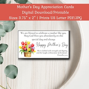May include: Printable Mother's Day card with a basket of colorful tulips and the text "We are blessed to celebrate a mother like you. May God bless you abundantly on this special day and always Happy Mother's Day She is clothed with strength and dignity, and she laughs without fear of the future. Proverbs 31:25"