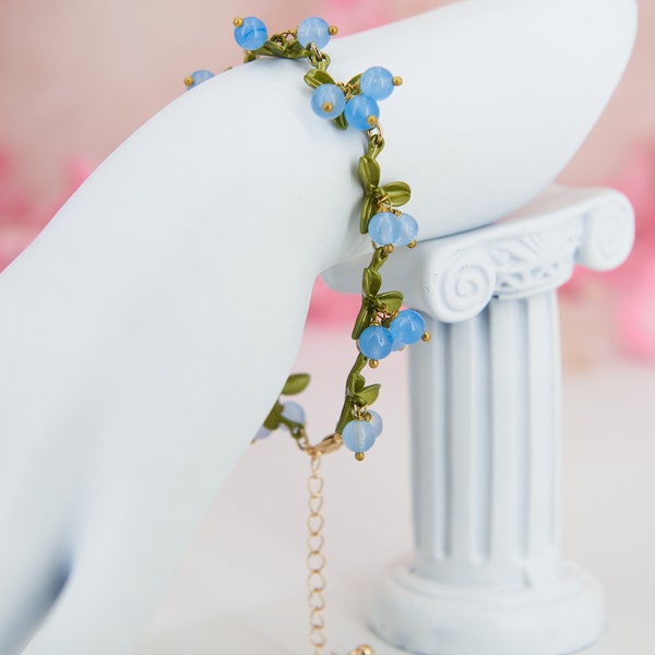 Cute cottagecore adjustable bracelet with blue berries and green leaves