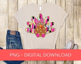 May include: A beige t-shirt featuring a graphic of a brown turkey with gold polka dots, a pink polka-dot bow, and colourful brushstroke-style tail feathers in shades of pink, blue, and black. The text PNG - DIGITAL DOWNLOAD is visible.