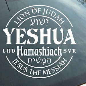 May include: White circular sticker with the text "Lion of Judah" and "Yeshua" in a stylized font. The sticker also includes the text "Hamashiach" and "Jesus the Messiah" in English and Hebrew.