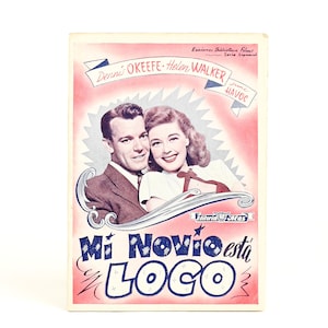 May include: Vintage movie poster for "Mi Novio Está Loco" featuring Dennis O'Keefe and Helen Walker. The poster has a pink and white background with the film's title in large blue letters. The actors are depicted in a romantic pose.