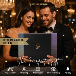 Personalized wedding gift for couple, couple is holding the premium magnetic gift box, smiling at their new wedding gift they just received for Christmas gifting