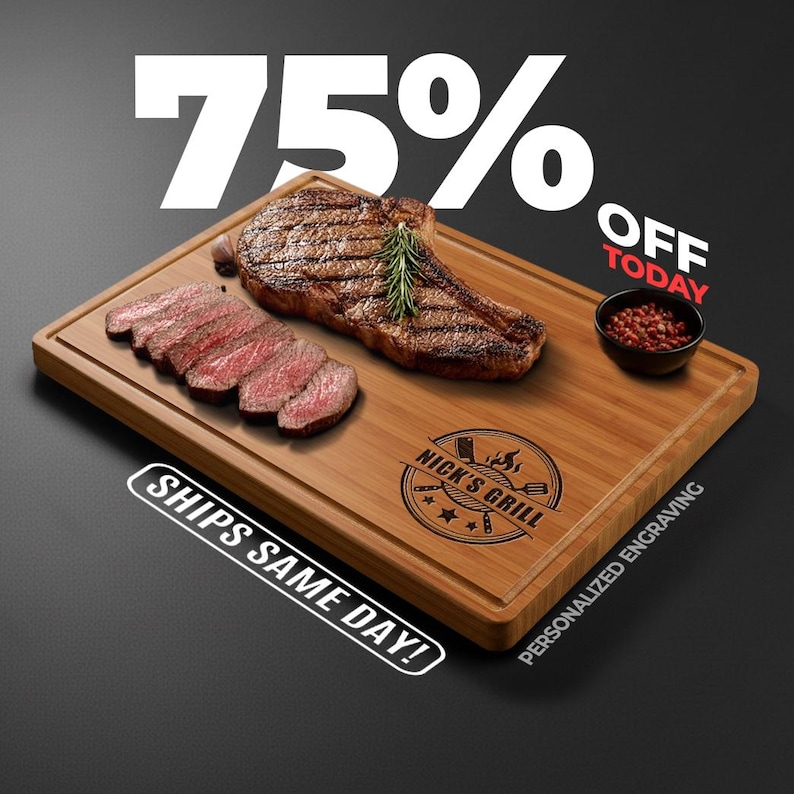May include: A wooden cutting board with a grilled steak and sliced steak. A small bowl of peppercorns is on the right. The board has the text "Nick's Grill" and "Personalized Engraving". The image also includes the text "75% OFF TODAY".