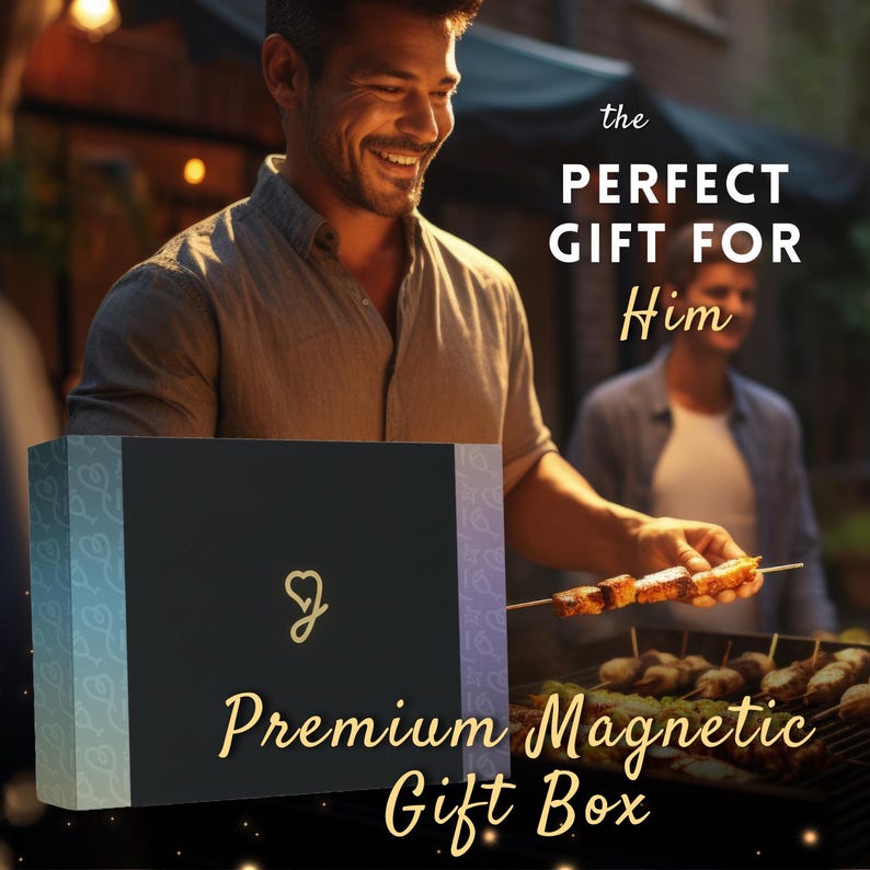 A man is holding a box with a logo on it, and there is another man grilling food in the background. The text overlay on the image reads "the PERFECT GIFT FOR Him Premium Magnetic Gift Box".