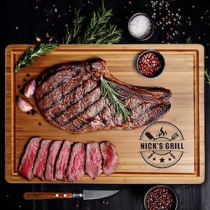 a large, well-cooked steak on a wooden cutting board, accompanied by various seasonings and garnishes.