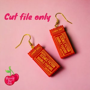 May include: A pair of red and gold earrings shaped like movie tickets. The tickets say "Science Fiction Double Feature" and "Admit One".