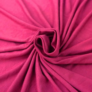 Tissu tricoté en jersey de rayonne épais rose chaud par cour - Style 406