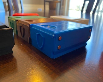 Cajas de almacenamiento de forma rectangular para piezas de juego