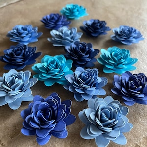 15pk Blue Starburst Rolled Paper Flowers 1” inch