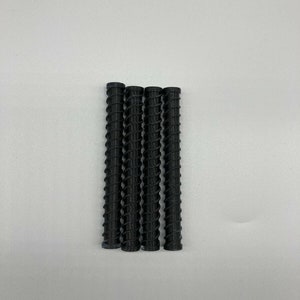 May include: Four black, spiral-shaped, plastic tubes.
