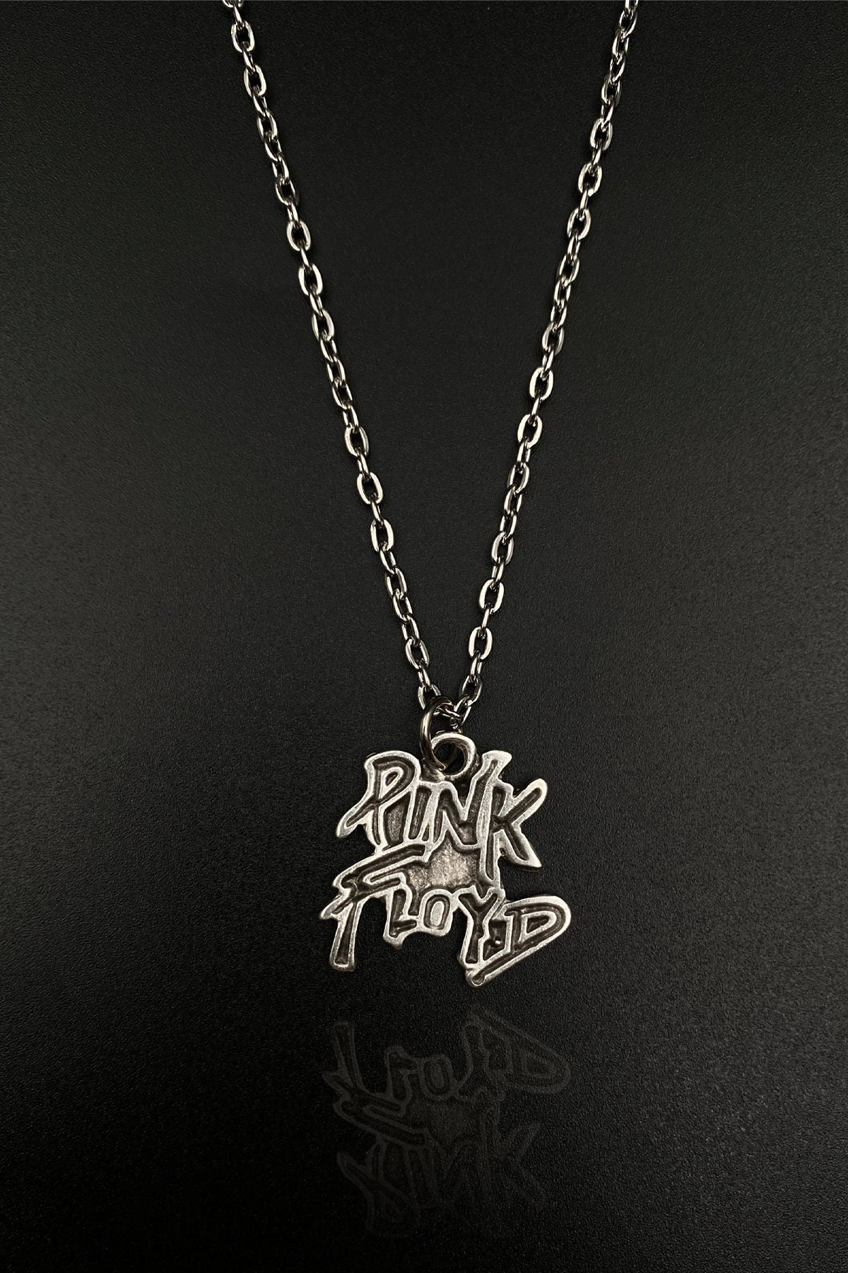 Rock band best sale necklaces