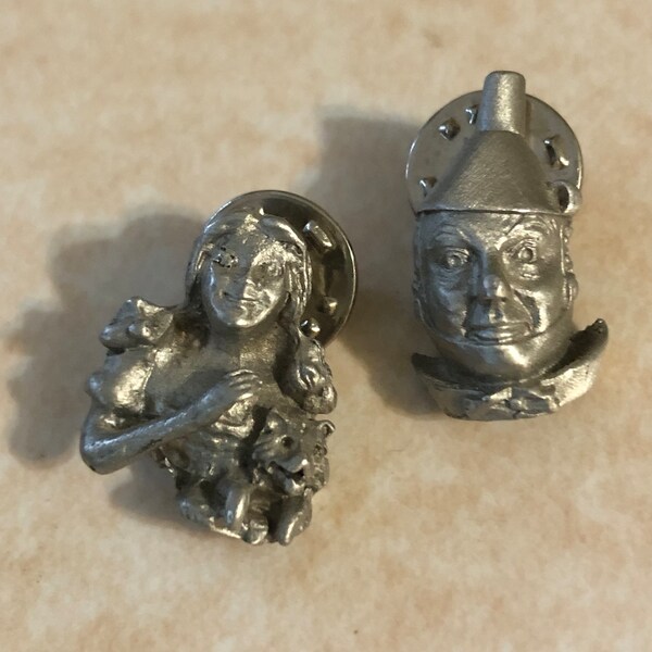 Pair of Wizard of Oz lapel pins Dorothy with Toto and Tin Man