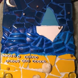 Handgjord strandmosaik