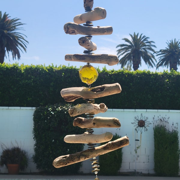 Yellow Mesmerizing gazing ball/Japanese float replica w/ matching sea glass and driftwood spinner 27" total hang length. Stunning to gaze at