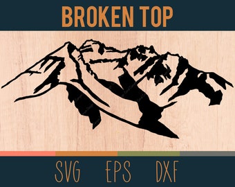 May include: Black silhouette of a mountain range with a broken peak, labelled "BROKEN TOP". The image is on a woodgrain background with the words "SVG", "EPS", and "DXF" below the image.