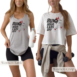 May include: A heather gray tank top and a white cropped t-shirt, both featuring a graphic of Minnie Mouse running and the text RUN YOUR EARS OFF in black. The tank top is paired with black shorts, and the cropped t-shirt is paired with black shorts.
