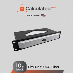 May include: A black metal 10-inch rack mount bracket designed for the Unifi UCG-Fiber device. The bracket features a rectangular frame with mounting holes on the sides and a central cutout. Text includes Calculated MFG, Made in USA, and 10 IN RACK.