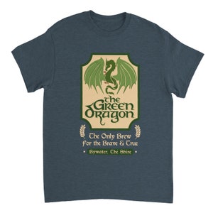 May include: A dark blue t-shirt with a green dragon graphic and the text "the GREEN Oragon" in a vintage style font. The text below the dragon reads "The Only Brew for the Brave & True" and "Bywater, The Shire."