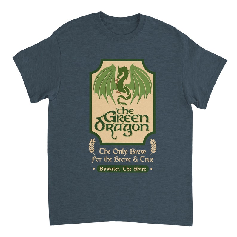 May include: A dark blue t-shirt with a green dragon graphic and the text "the GREEN Oragon" in a vintage style font. The text below the dragon reads "The Only Brew for the Brave & True" and "Bywater, The Shire."