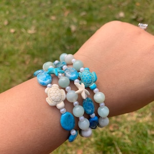 Ocean Vibes Bracelet with Caribbean Calcite, Crazy Lace Agate, Turtle, and Starfish Charms
