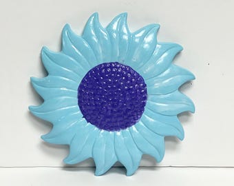 Flor azul de cerámica