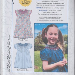 May include: A sewing pattern for a "Daisy" dress for girls, sizes 2-8 years. The pattern includes two views: a traditional bishop style dress with a short puff sleeve and a version with a ruffle sleeve. The pattern includes instructions for smocking the yoke and sleeves. The pattern is made by Meco Modes Collection.