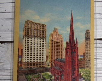 Vintage 1943 "Trinity Church at Broadway and Wall St., New York City) Linen w/ Color Lithograph Rare Postcard. Postmarked 1943, in VG cond.