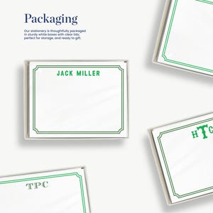 several blank stationery items, including name cards and envelopes, with green borders and text. The text on the items reads "Jack Miller" and "HTC", indicating the brand or company associated with the products.