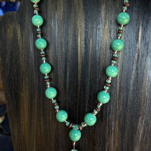 Mint green and antique brass beaded necklace with drop