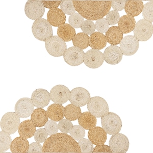 May include: Two half-circle jute rugs. Each rug features a pattern of tightly wound, varying-sized circles in natural beige and tan hues. The rugs are arranged to create a symmetrical design, suitable for home decor.