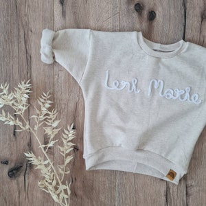 Weicher oversize Pulli mit Name einfarbig meliert Baby und Kleinkindkleidung Bild 1