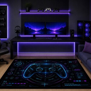 May include: A rectangular area rug featuring a large, central blue and purple glowing game controller graphic surrounded by digital interface elements, HUD-style circular patterns, and technical data readouts on a dark black background.
