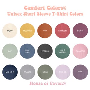 May include: A color chart showing 15 different colors of unisex short sleeve t-shirts. The colors are: Ivory, Mustard, Yam, Crimson, Berry, Bay, Blue Jean, Pepper, Light Green, Blossom, Midnight, Granite, Moss, Orchid, and Wine. The chart is titled "Comfort Colors&reg; Unisex Short Sleeve T-Shirt Colors" and "House of Pavan&reg;".