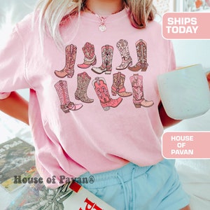 Close-up of pink cowgirl boots print design
