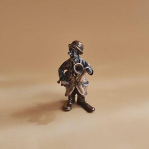Figura de payaso trompetista vintage de plata y bronce firmada por Vittorio Angini y Pietro Sorini