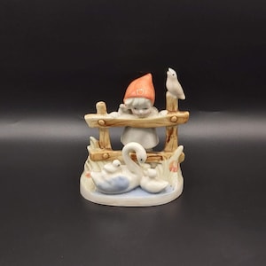 Vintage  Dutch Girl Looking Over Fence at Swans Porcelain Figurine