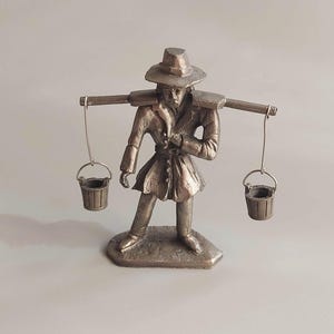 Vintage Water Carrier Daalderop Royal Holland Pewter Figura RARE, Figura de estaño coleccionable