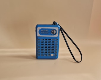 Rádio transistorizado vintage SHARP BP-170, rara cor azul, não funciona.