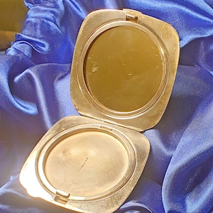 Vintage silver powder compact 1947