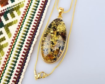 Green Baltic Amber Pendant: Gold Plated Sterling Silver 925 Teardrop