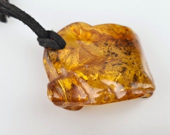 Raw Green Baltic Amber Pendant: Natural Gemstone Amulet